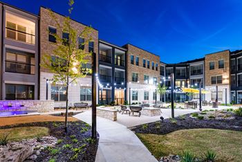 our apartments showcase a beautiful courtyard at night